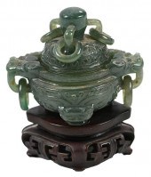 A SMALL CHINESE CARVED GREEN J