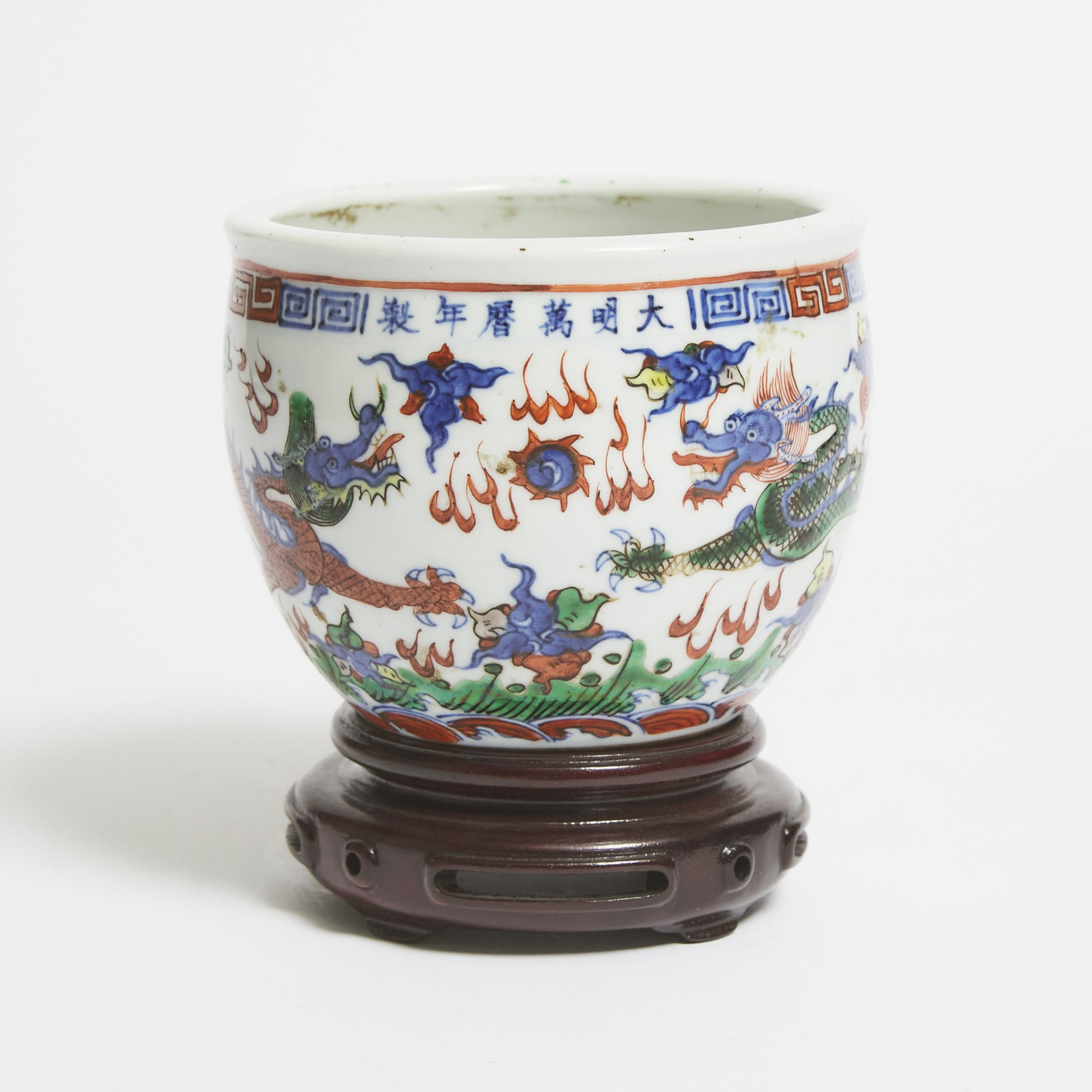 A Small Doucai 'Dragon' Jardinière,