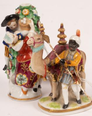 A small figural scent bottle
