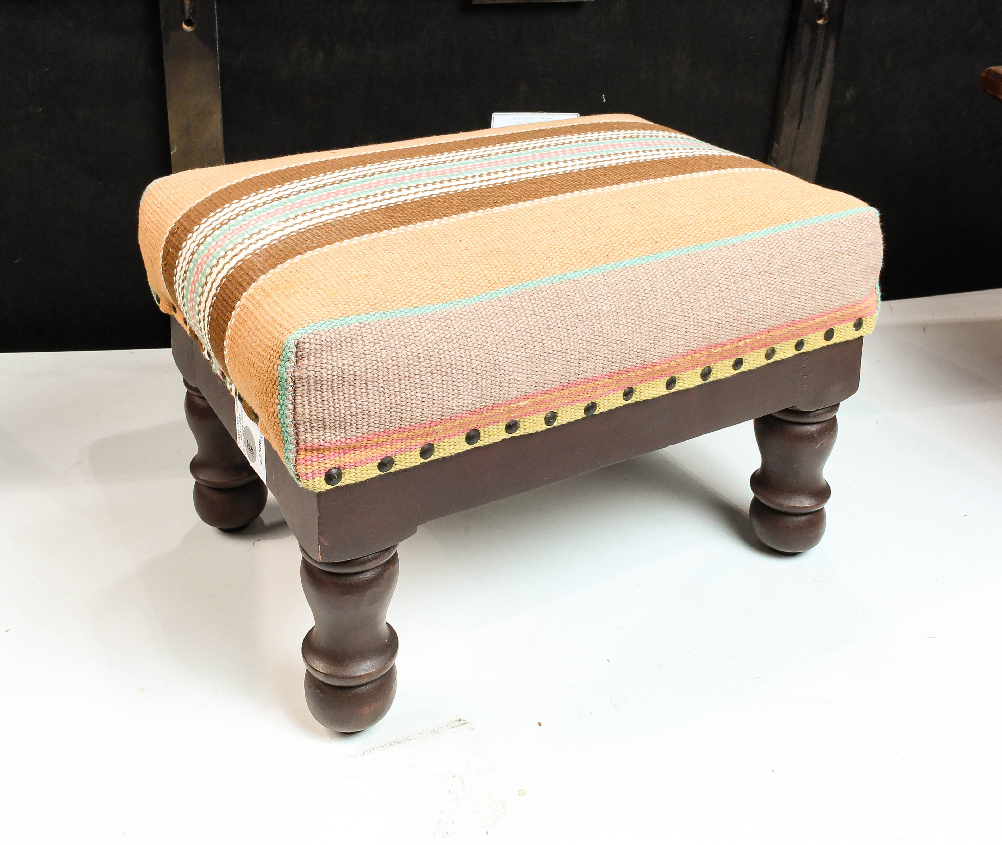 A SMALL FLATWEAVE UPHOLSTERED