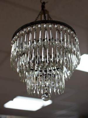 A small glass light fitting, the