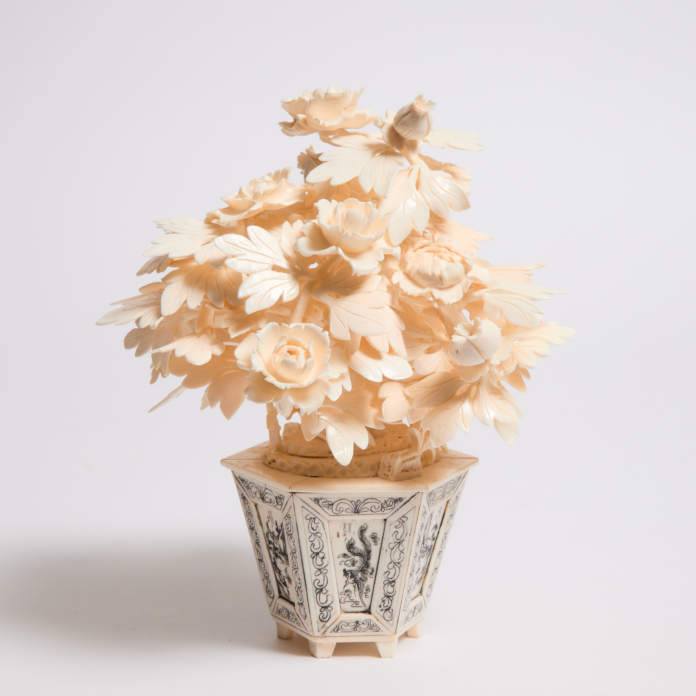 A Small Ivory Carved Flower