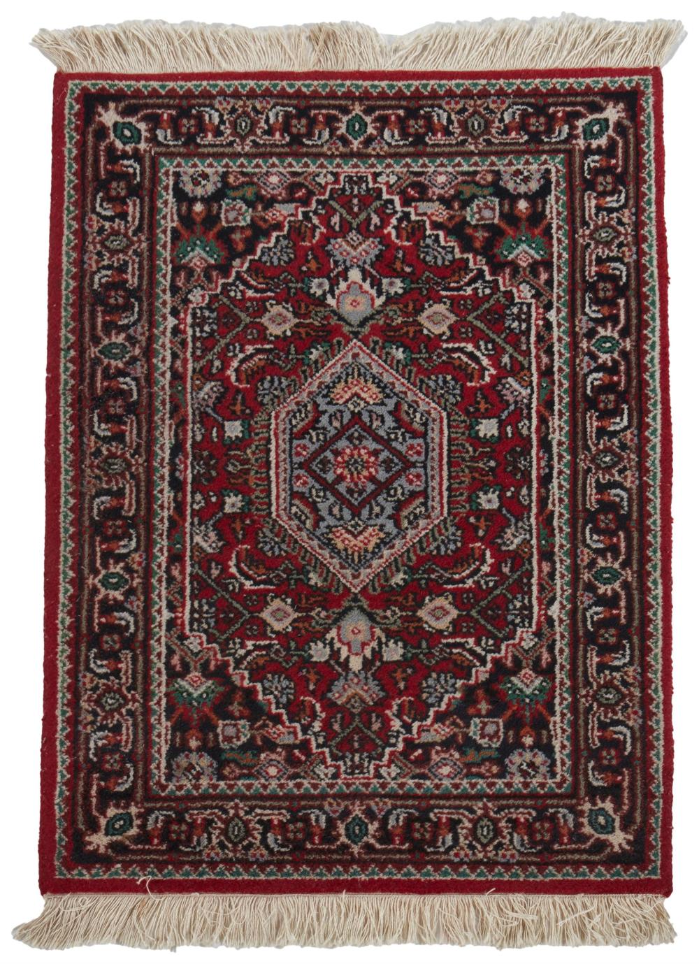 A SMALL KASHAN RUGA small Kashan