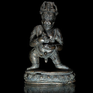 A Small Nepalese Bronze Figure of