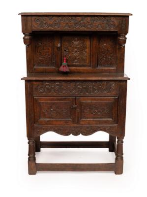 A small oak court type cupboard
