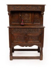 A small oak court type cupboar