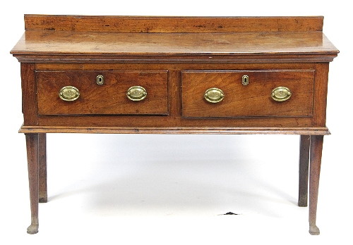 A small oak dresser fitted two