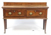 A small oak dresser fitted two