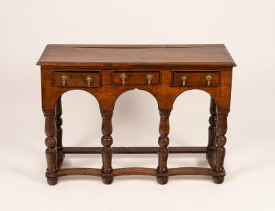 A small oak low dresser fitted