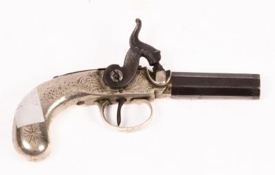 A small percussion cap pistol,