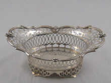 A small pierced silver basket