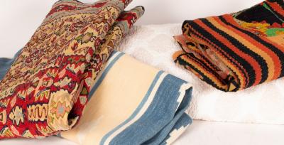 A small rug, a blue and cream