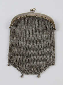 A small silver mesh purse with