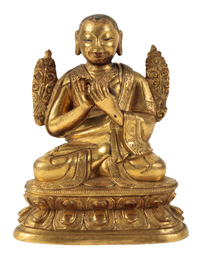 A SMALL SINO-TIBETAN GILT BRONZE OF