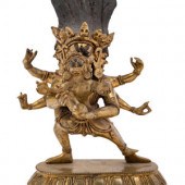 A Small Tibetan Gilt Bronze Fi