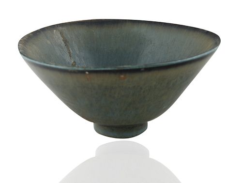 A SMALL TRIANGULAR GLAZED STONEWARE