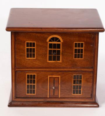 A small two drawer chest in the