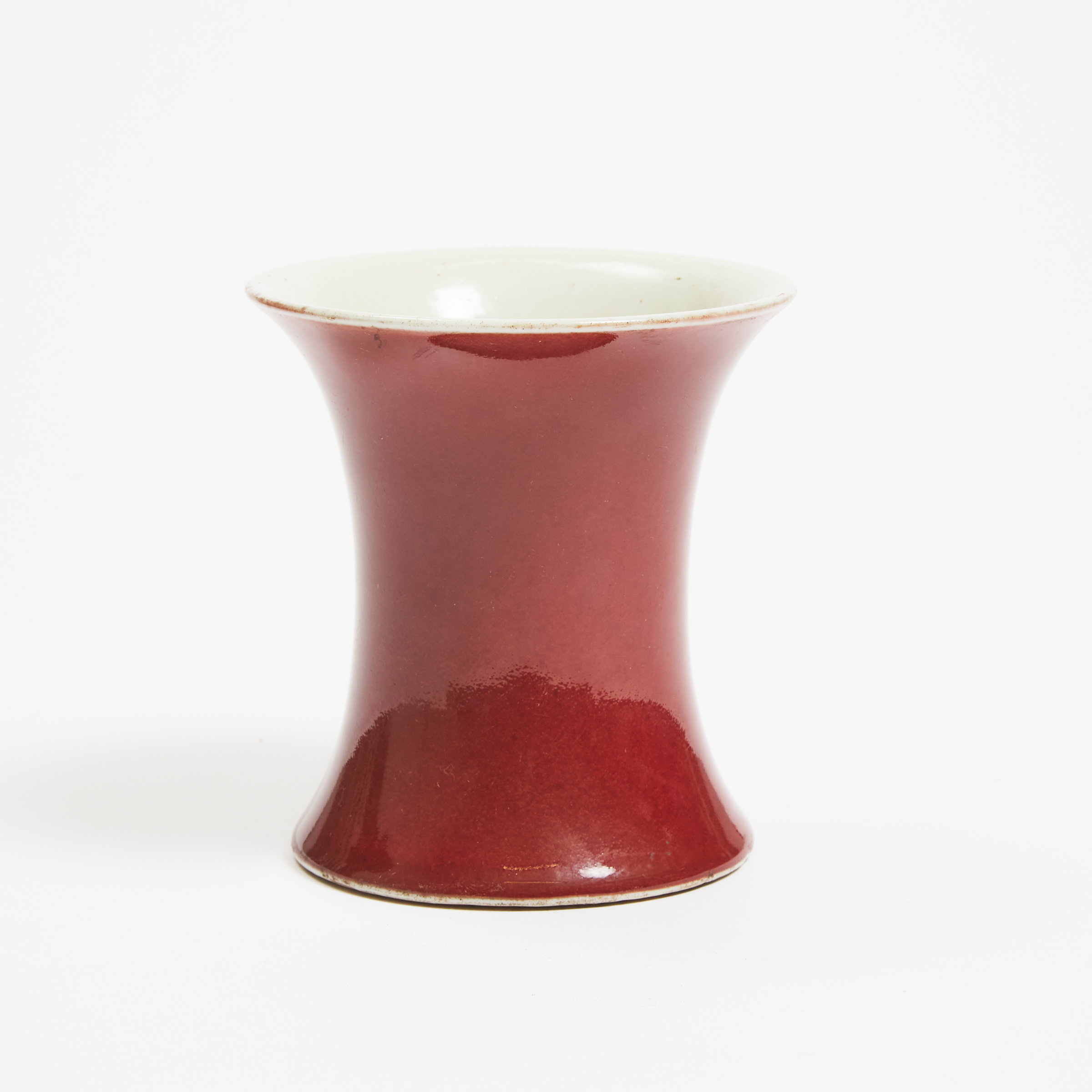 A Small Waisted Copper-Red Vase,