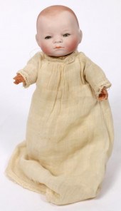A SOLID DOME BISQUE HEAD GRACE