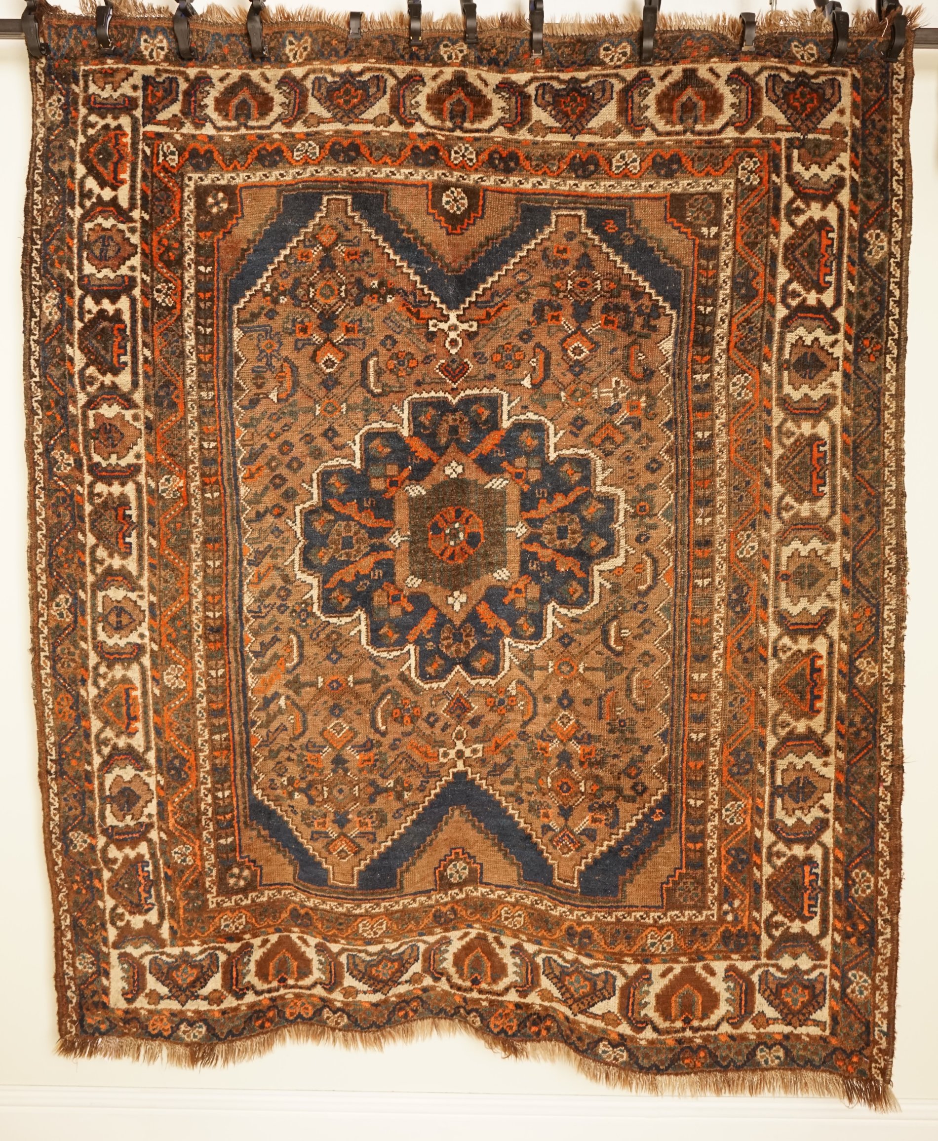 A SOUTH PERSIAN RUG The brown field