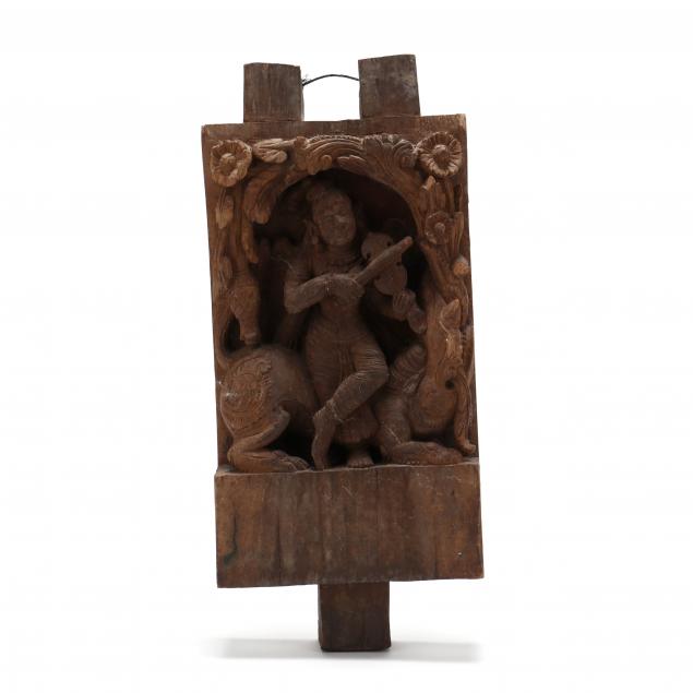A SOUTHEAST ASIAN CARVED WOOD
