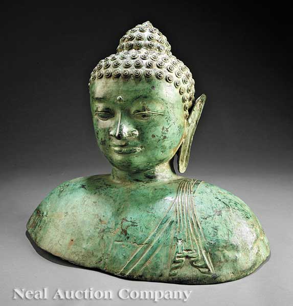 A Southeast Asian Patinated Brass