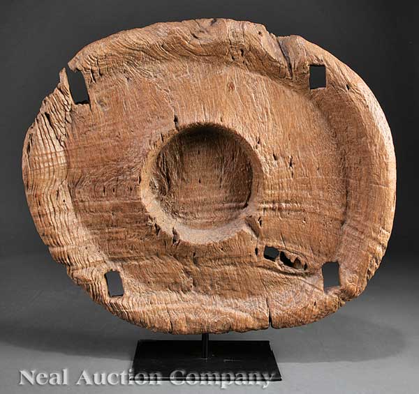 A Southeast Asian Teak Grinding