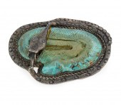 A SOUTHWEST CARVED TURQUOISE S