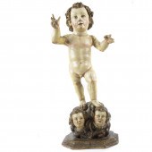 A SPANISH CARVED AND POLYCHROM