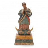 A SPANISH COLONIAL CARVED SANT