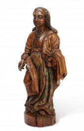 A SPANISH COLONIAL WALNUT SANT