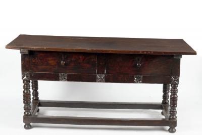 A Spanish stained walnut serving