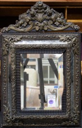 A SPANISH STYLE LOOKING GLASS