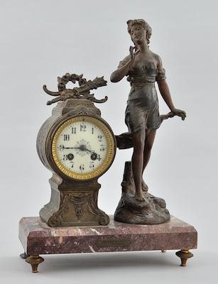 A Spelter Figural Clock on Marble