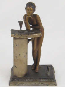 A spelter table cigar lighter in