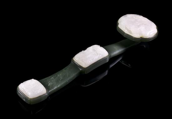 A Spinach Jade and White Jade Inset