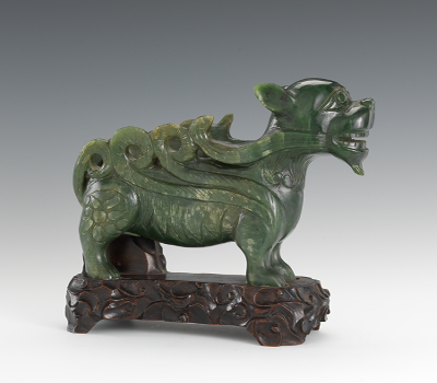 A Spinach Jade Foo Dog Figurine
