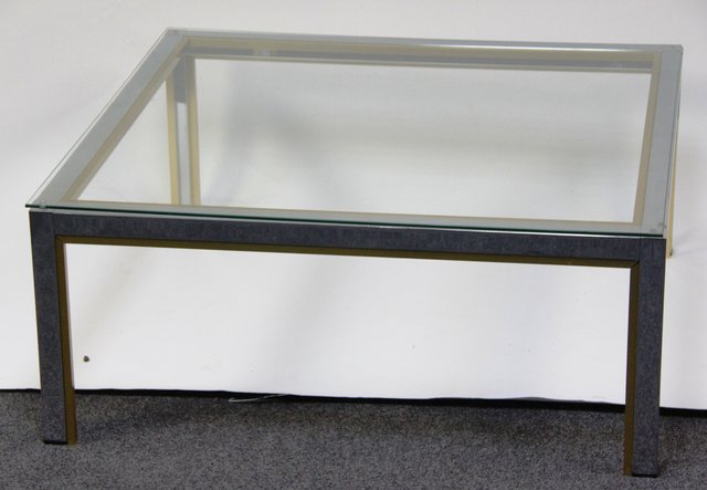A square glass topped coffee