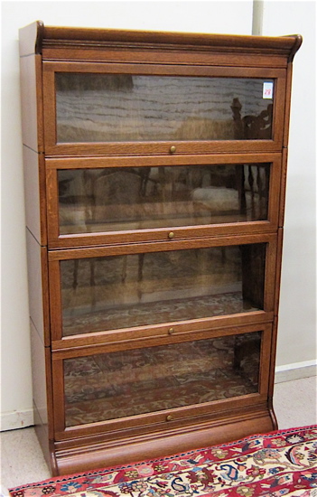 A STACKING OAK BOOKCASE American c.