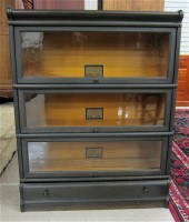 A STACKING OAK BOOKCASE The Gl