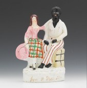 A Staffordshire Figural Group