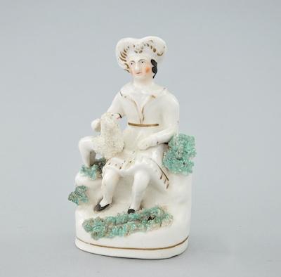 A Staffordshire Figural Seated