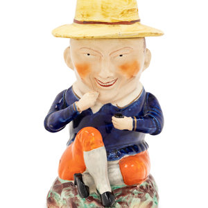 A Staffordshire Figural Tobacco Jar