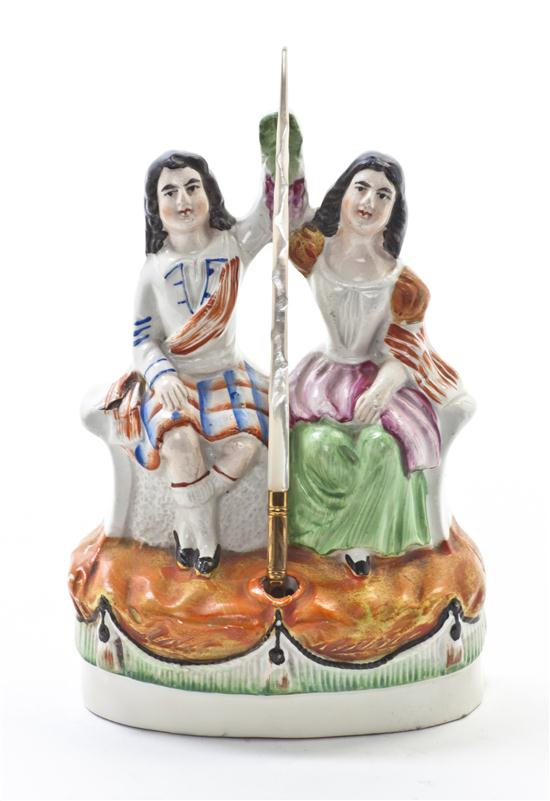 * A Staffordshire Inkwell depicting