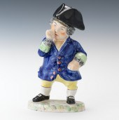 A Staffordshire "Snuff Taker"