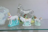 A STAFFORDSHIRE ZEBRA FIGURINE