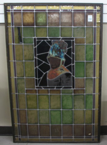 A STAINED AND LEADED GLASS WINDOW