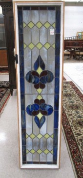 A STAINED AND LEADED GLASS WIN