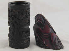 A stained carved ivory figure of