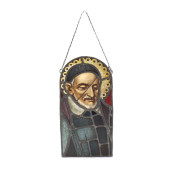 A STAINED GLASS PANEL OF SAINT